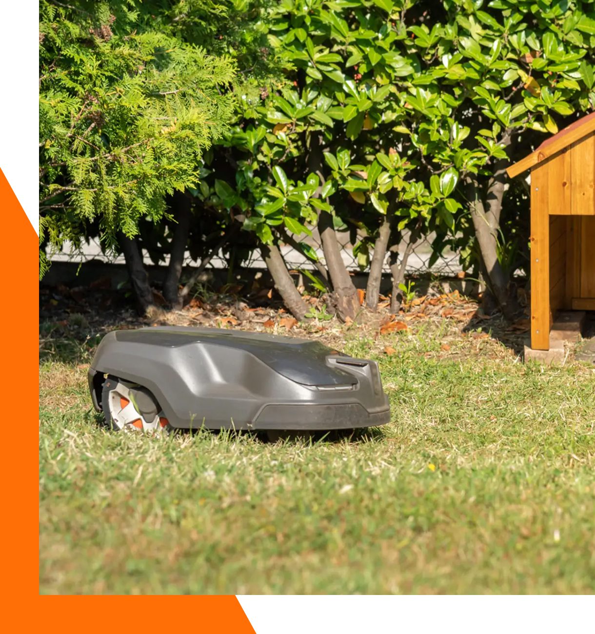 Robotic lawn mower on grassy yard.